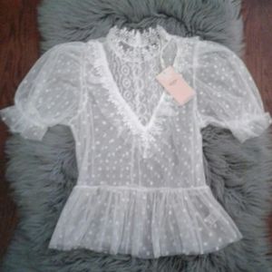 Polka dot embellished blouse
